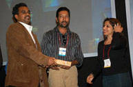 Anjan Rreceiving Prize